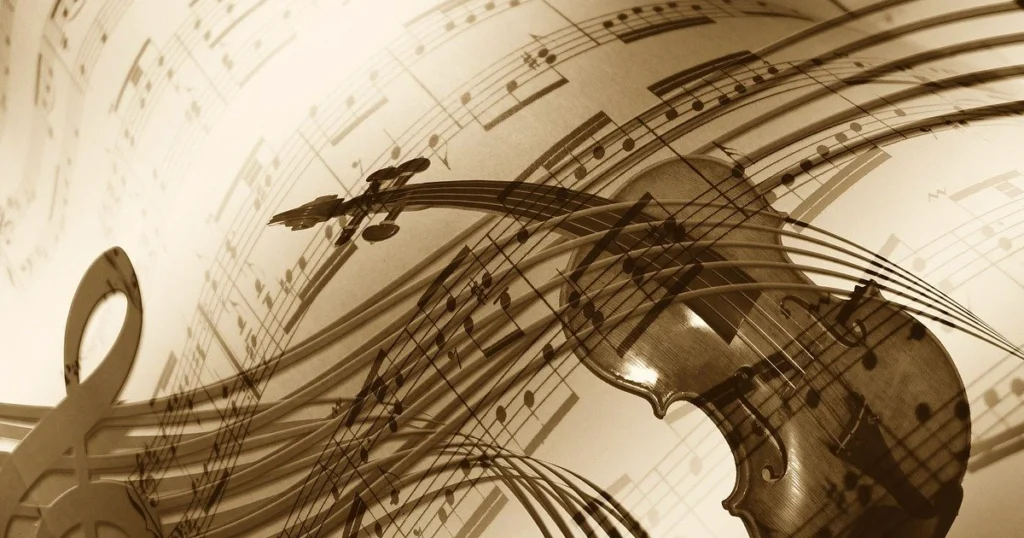 imagem da notação musical partitura, com a cor do papel um pouco amarelada, uma clave de sol e um viollino em cima da partitura
